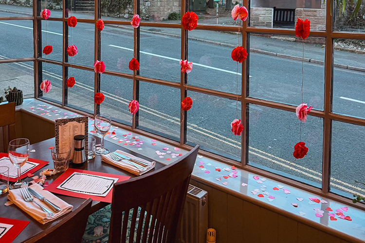 Valentine's Day table setting inside Pendletons Restaurant in Shanklin Old Village