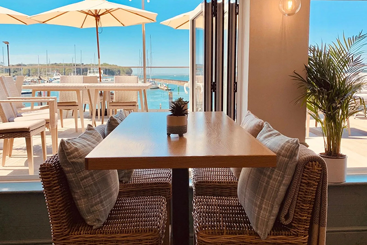Interior of The Terrace restaurant overlooking Yarmouth Harbour